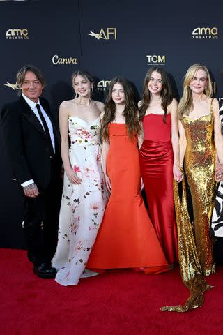 <p>Michael Kovac/Getty</p> (L-R) Keith Urban, Sunday Urban, Faith Urban, Sybella Hawley, honoree Nicole Kidman attend the 49th AFI Life Achievement Award: A Tribute To Nicole Kidman at Dolby Theatre on April 27, 2024 in Los Angeles, California.