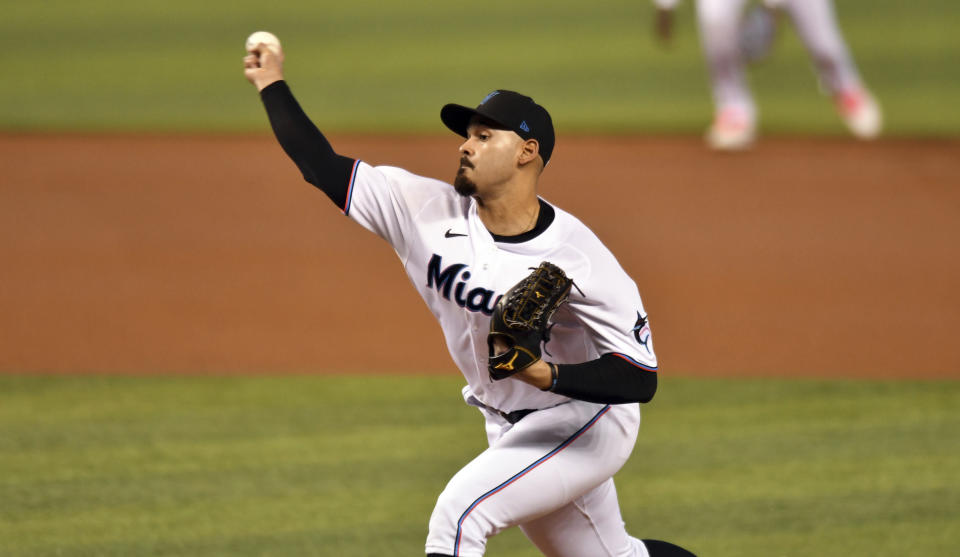 Miami Marlins' pitcher Pablo Lopez pitches against the Atlanta Braves during the first inning of a baseball game, Sunday, June 13, 2021, in Miami. (AP Photo/Jim Rassol)