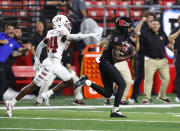 Rutgers wide receiver JaQuae Jackson (9) runs for yardage after a catch against Temple cornerback Ben Osueke (24) during the first half of an NCAA college football game, Saturday, Sept. 9, 2023, in Piscataway, N.J. (AP Photo/Noah K. Murray)