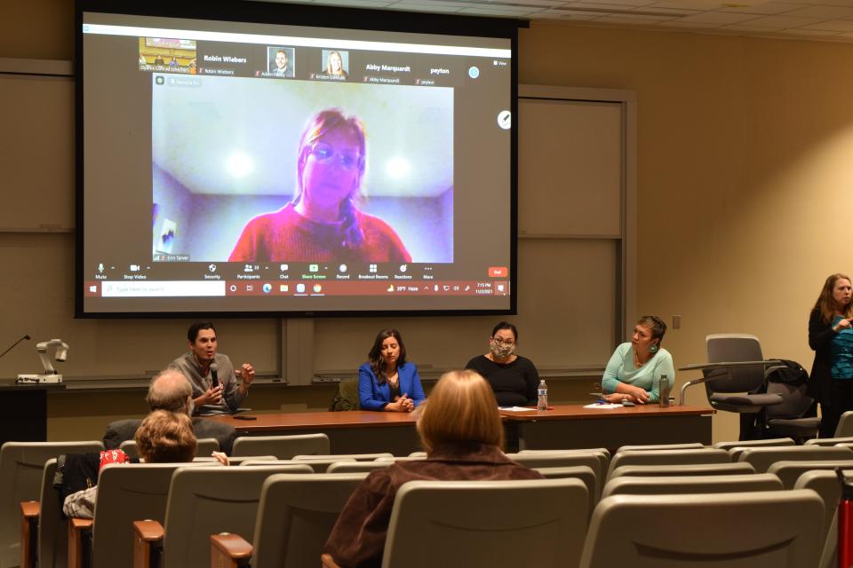 From left to right, John Little, Erin Tarver (on Zoom), Sarah White, Elise Boxer and Aldora WhiteEagle speak in a panel at the University of South Dakota on Nov. 2, 2021 for a conversation on Indigenous history, culture and resilience in South Dakota’s schools.