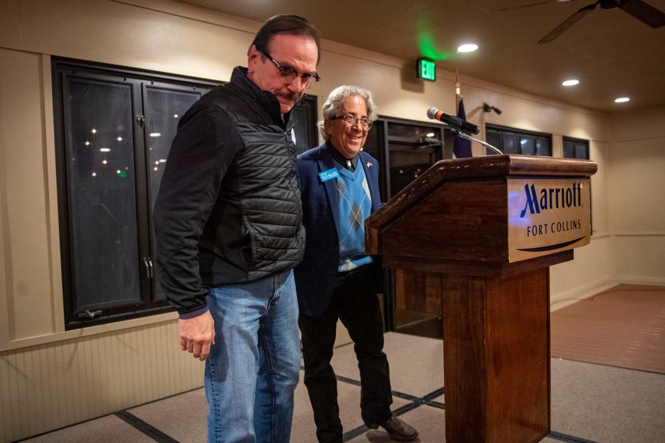 Gil Barela, chair of the Larimer County Democratic Party, introduces Larimer County Commissioner John Kefalas during an election party hosted by the Larimer County Democrats at the Marriott in Fort Collins, Colo., on Tuesday, Nov. 8, 2022.