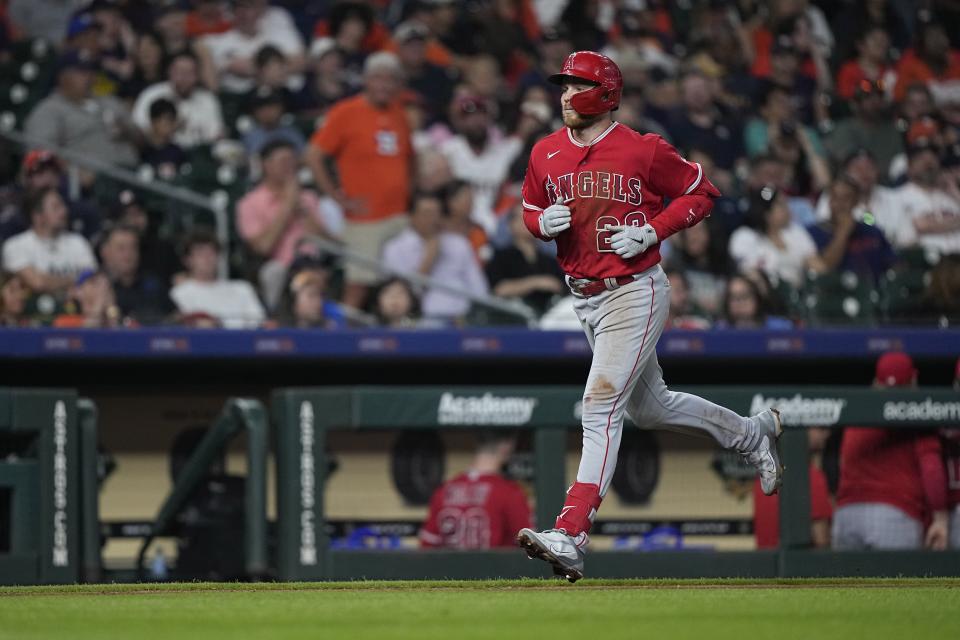 Los Angeles Angels' Brandon Drury runs down the third base line after hitting a home run against the Houston Astros during the fifth inning of a baseball game Thursday, June 1, 2023, in Houston. (AP Photo/David J. Phillip)