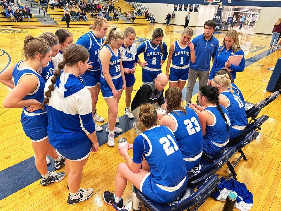 Van Meter head coach Jay Olson talks to his players during a timeout against Des Moines Christian on Saturday, Feb. 11, 2023.