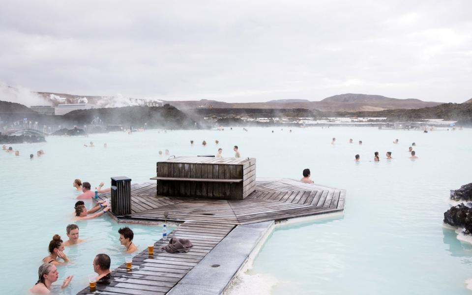 People at the Blue Lagoon, Iceland - Getty