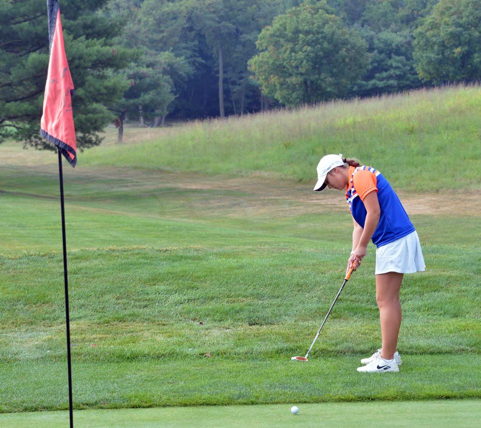 Boonsboro's Piper Meredith putts from the fringe on to the first green during the Washington County Public Schools golf tournament at Black Rock.