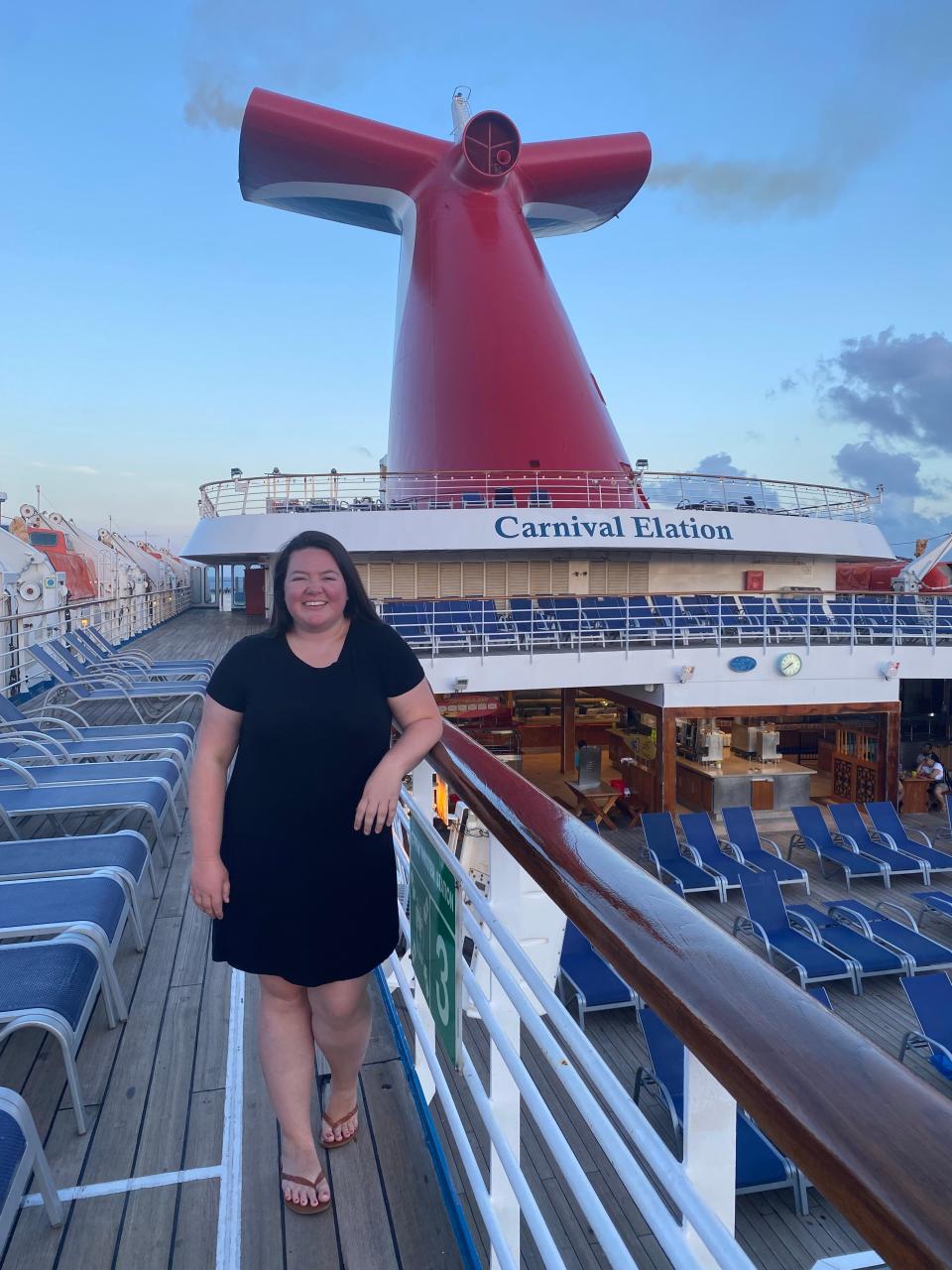 megan standing on deck of carnival elation