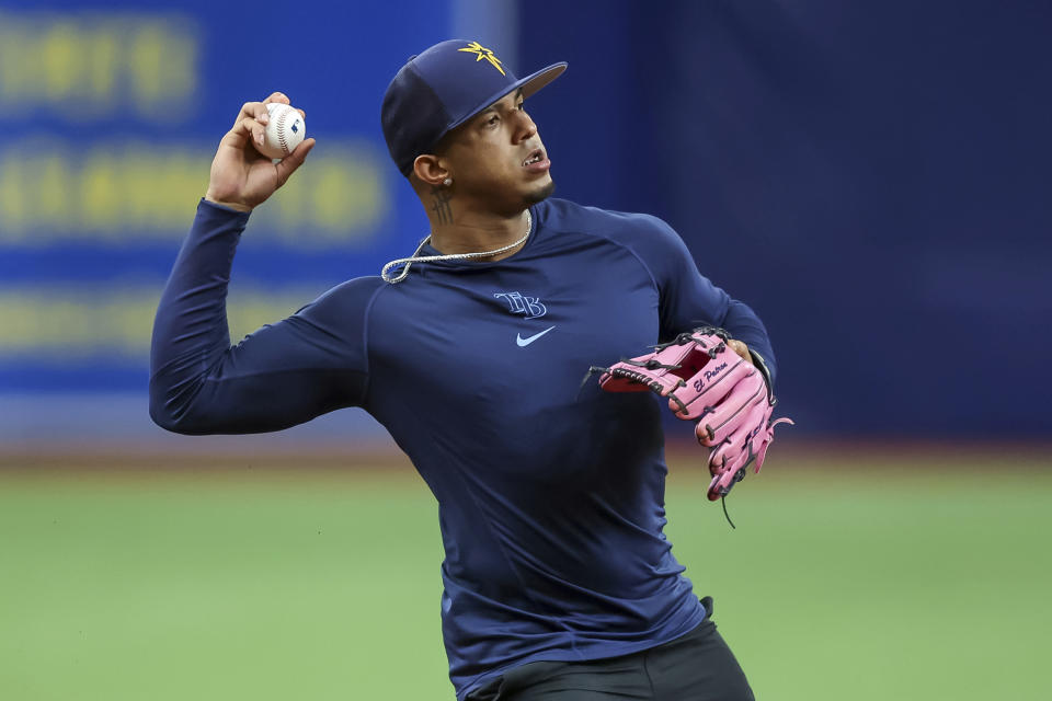 Tampa Bay Rays' Wander Franco fields a ground ball as he works his way back from the injured list prior to a baseball game against the Los Angeles Angels Tuesday, Aug. 23, 2022, in St. Petersburg, Fla. (AP Photo/Mike Carlson)