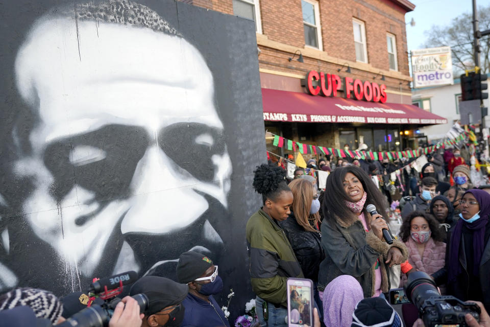 Angela Harrelson, right, aunt of George Floyd, talks to supporters at George Floyd Square after a guilty verdict was announced at the trial of former Minneapolis police Officer Derek Chauvin for the 2020 death of Floyd, Tuesday, April 20, 2021, in Minneapolis. Chauvin has been convicted of murder and manslaughter in the death of Floyd. (AP Photo/Julio Cortez)