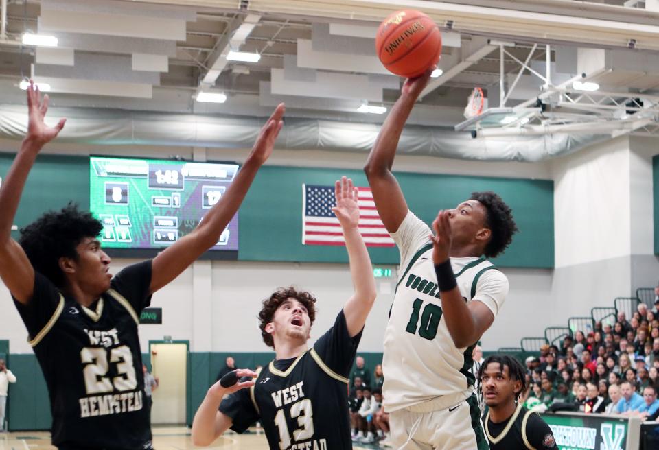 Woodlands Eric Woodbury (10) puts up a shot against West Hempstead during the state Class B regional final at Yorktown High School March 9, 2024.