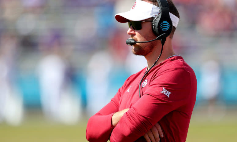 A closeup of Oklahoma football coach Lincoln Riley during a game.