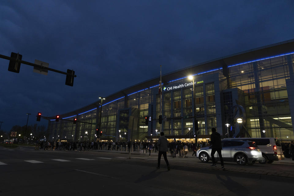 Shareholders arrive outside CHI Health Center Omaha for the Berkshire Hathaway annual meeting on Saturday, May 6, 2023, in Omaha, Neb. (AP Photo/Rebecca S. Gratz)