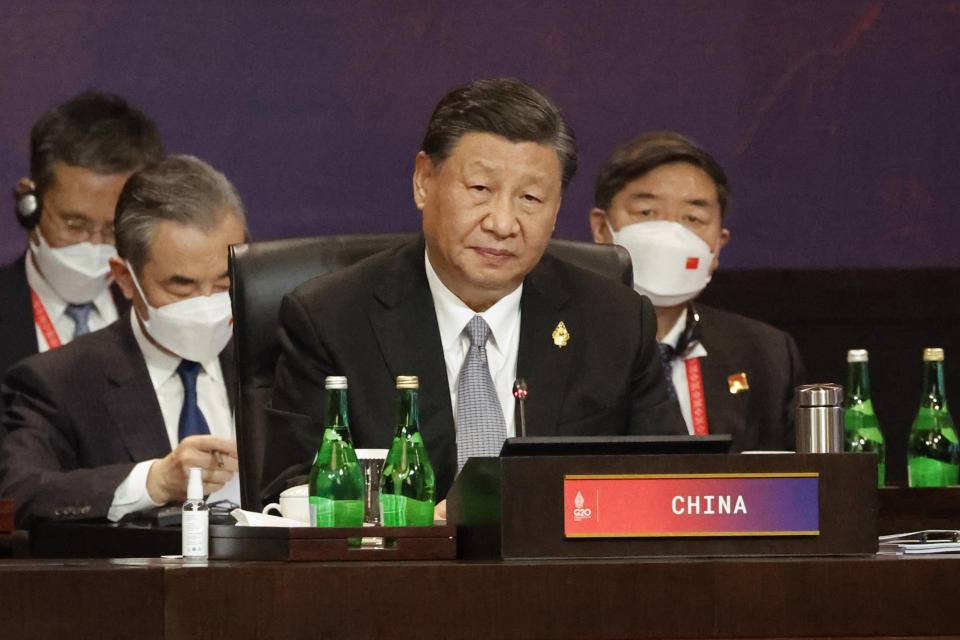 FILE - Chinese President Xi Jinping attends a session at the G20 Leaders' Summit in Nusa Dua, Bali, Indonesia, Wednesday, Nov. 16, 2022. China and India, after months of refusing to condemn Russia’s war in Ukraine, did not stand in the way of the public release this week of a statement by the world’s leading economies that strongly criticizes Moscow. (Willy Kurniawan/Pool Photo via AP, File)