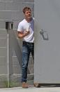 The star looked casual for the day in jeans, a white t-shirt and brown boots.