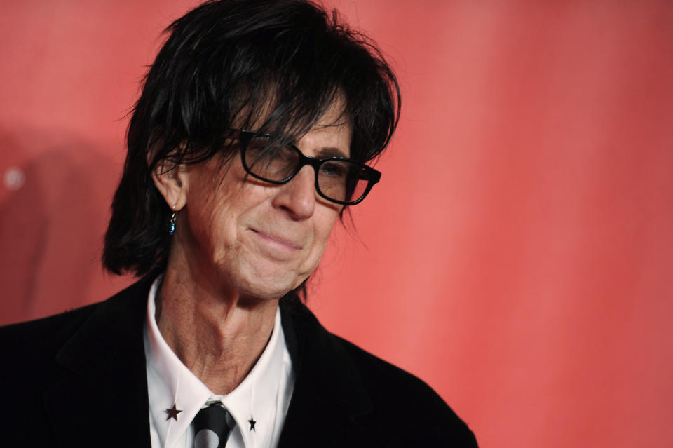 FILE - In this Feb. 6, 2015, file photo, Ric Ocasek of the Cars arrives at the MusiCares Person of the Year event at the Los Angeles Convention Center in Los Angeles. Ocasek, famed frontman for The Cars rock band, has been found dead in a New York City apartment. The New York City police department said officers responding to a 911 call found the 75-year-old Ocasek on Sunday, Sept. 15, 2019. (Photo by Richard Shotwell/Invision/AP, File)