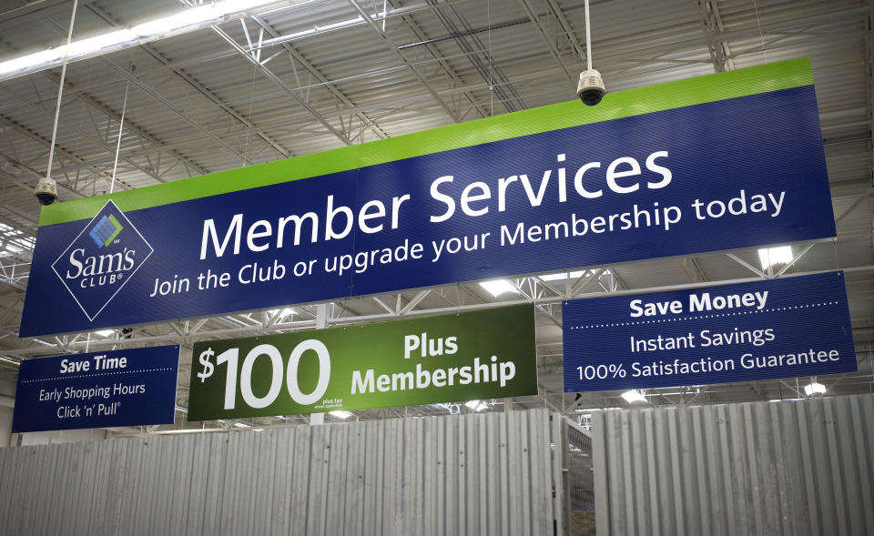 A member's services sign hangs in Sam's Club in Bentonville, Arkansas June 5, 2014.  The Walmart Stores Inc. annual shareholder meeting takes place June 6, 2014. REUTERS/Rick Wilking (UNITED STATES - Tags: BUSINESS)