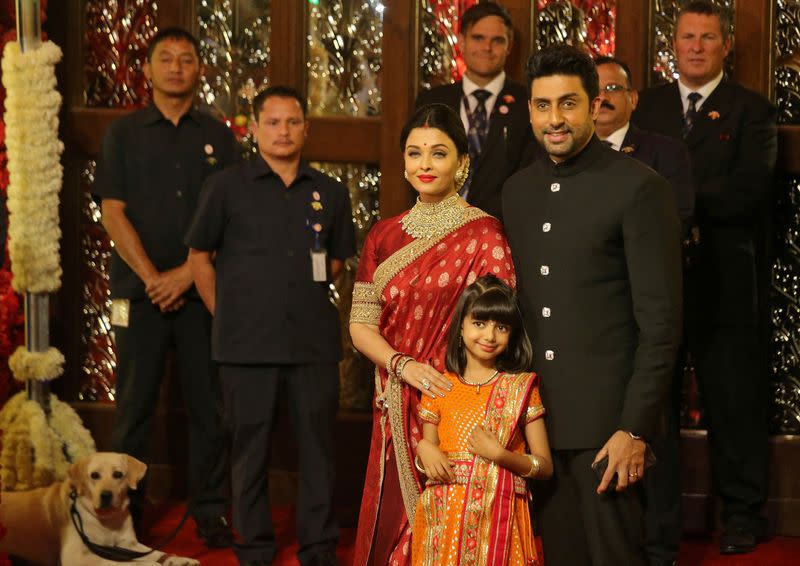 FILE PHOTO: Actor Abhishek Bachchan, his wife actress Aishwarya Rai and their daughter Aaradhya arrive to attend the wedding ceremony of Isha Ambani, the daughter of the Chairman of Reliance Industries Mukesh Ambani, in Mumbai