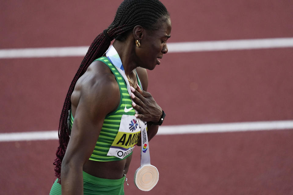 Tobi Amusan, of Nigeria, celebrates winning the women's 100-meter hurdles final at the World Athletics Championships on Sunday, July 24, 2022, in Eugene, Ore. (AP Photo/Gregory Bull)