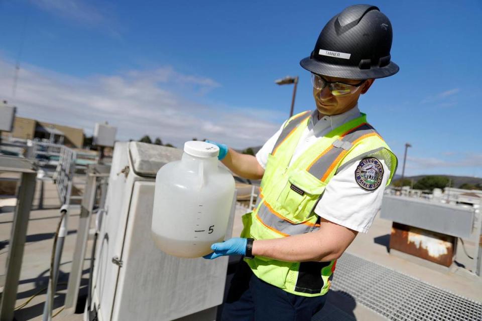 Tanner Duncan, water quality laboratory analyst for the City of San Luis Obispo, prepares a sample of wastewater for testing. The SLO County Public Health Department uses wastewater surveillance to monitor COVID prevalence in San Luis Obispo County.