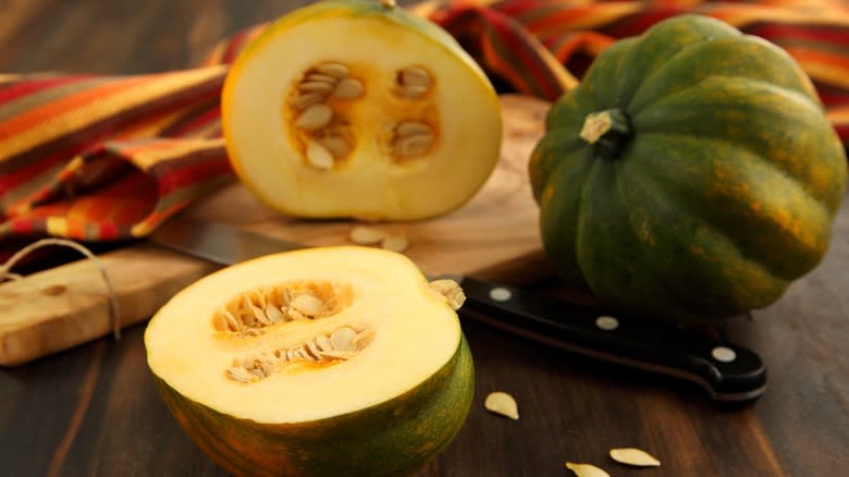 whole and halved acorn squash