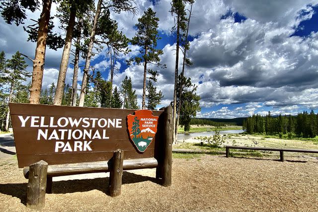<p>Getty Images</p> A stock photo of a Yellowstone National Park sign.