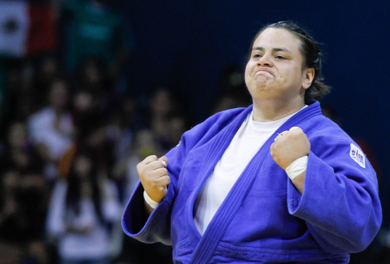 Mexico´s Vanessa Zambotti, celebrates her bronze medal, during the women´s Judo +78kg finals at the Pan American Games in Guadalajara, Mexico, Wednesday Oct. 26, 2011. (AP Photo/Bernardo De Niz)