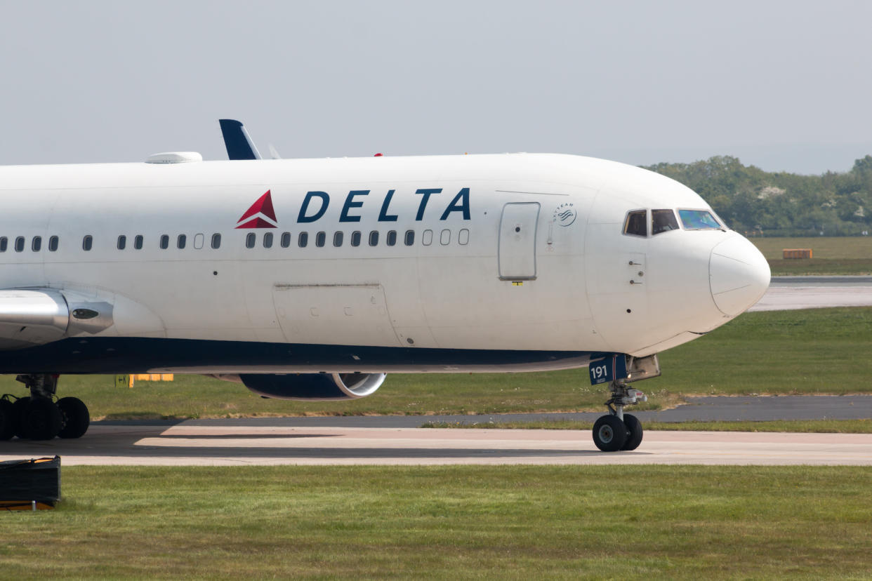 Manchester, United Kingdom - May 11, 2017: American Airlines Boeing 767-300 wide-body passenger plane (N191DN) taxiing on Manchester International Airport tarmac.