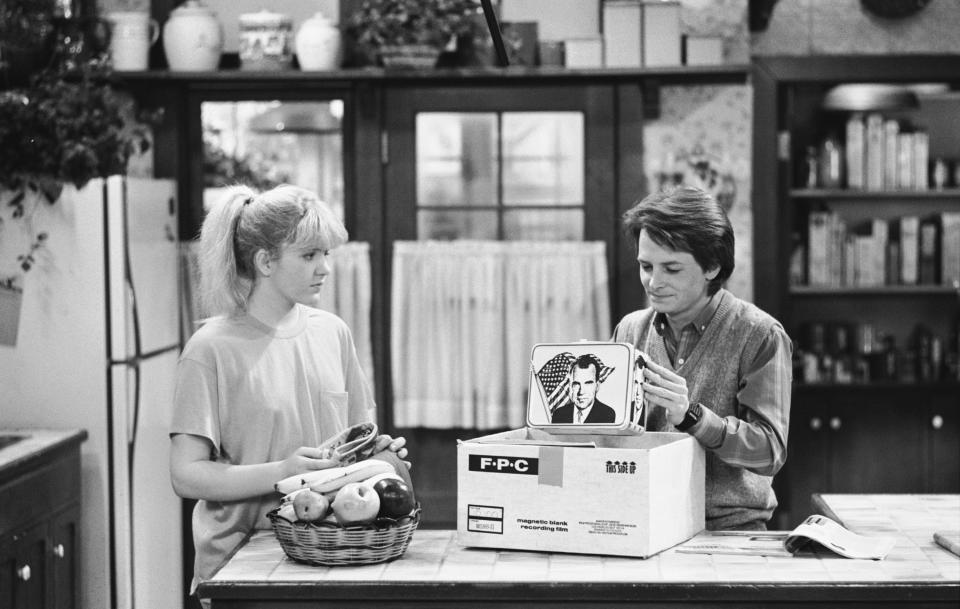 FAMILY TIES -- "Paper Chase" Episode 24 -- Aired 5/8/86 -- Pictured: (l-r) Tina Yothers as Jennifer Keaton, Michael J. Fox as Alex P. Keaton -- Photo by: NBCU Photo Bank  **FOR EDITORIAL USE ONLY AND CANNOT BE ALTERED, ARCHIVED OR RESOLD. NO TABLOID USAGE WORLDWIDE. SPECIFIC CLEARANCE REQUIRED FOR COMMERCIAL OR PROMOTIONAL USE. CONTACT YOUR NBCU REPRESENTATIVE FOR FURTHER INFORMATION**