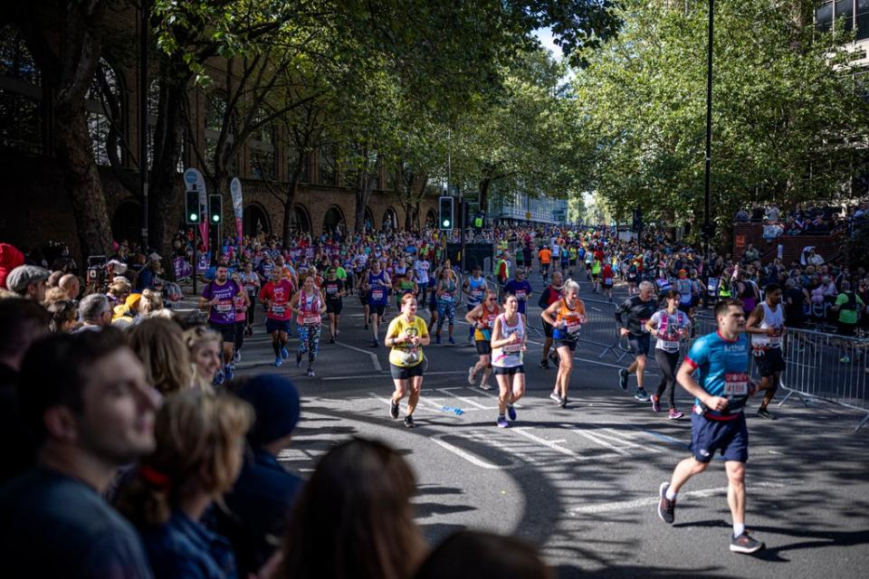 Runners on The Highway as they take part in the London Marathon at Tower Bridge (Getty)