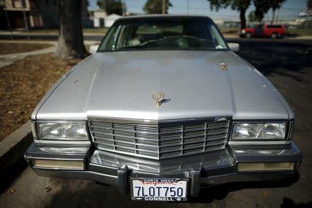 The Cadillac car belonging to Victor Augustine, 53, which he sleeps in, is seen at a homeless motorhome and tent encampment near LAX airport in Los Angeles, California, United States, October 26, 2015. REUTERS/Lucy Nicholson