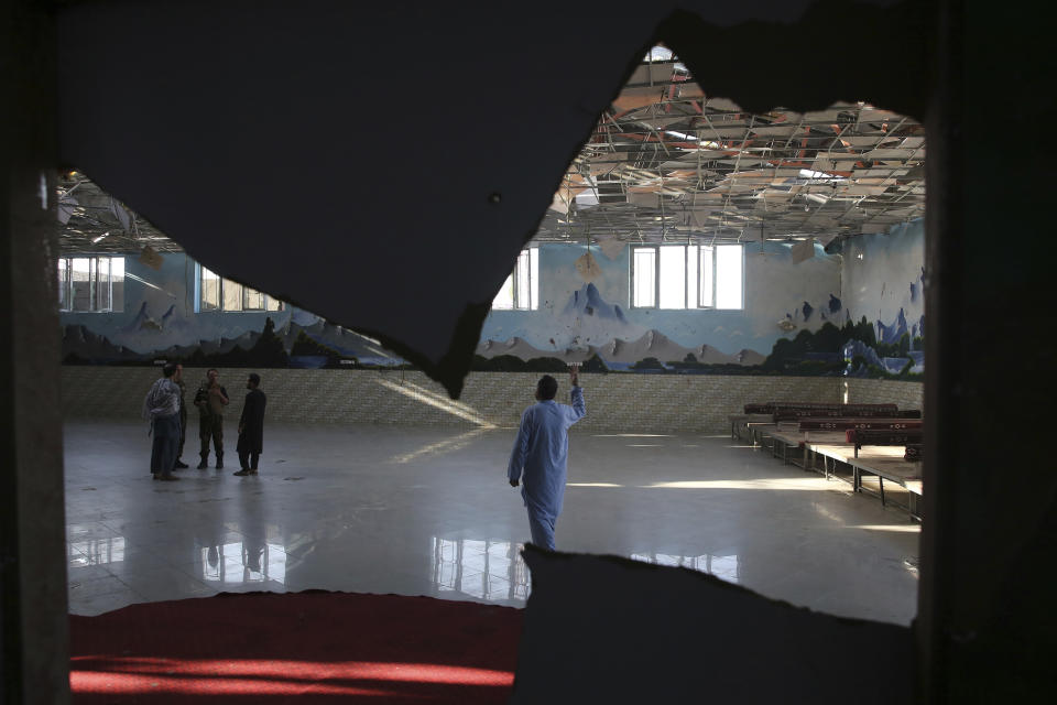 Damaged Dubai City wedding hall is seen after an explosion in Kabul, Afghanistan, Sunday, Aug.18, 2019. A suicide-bomb blast ripped through a wedding party on a busy Saturday night. (AP Photo/Rafiq Maqbool)