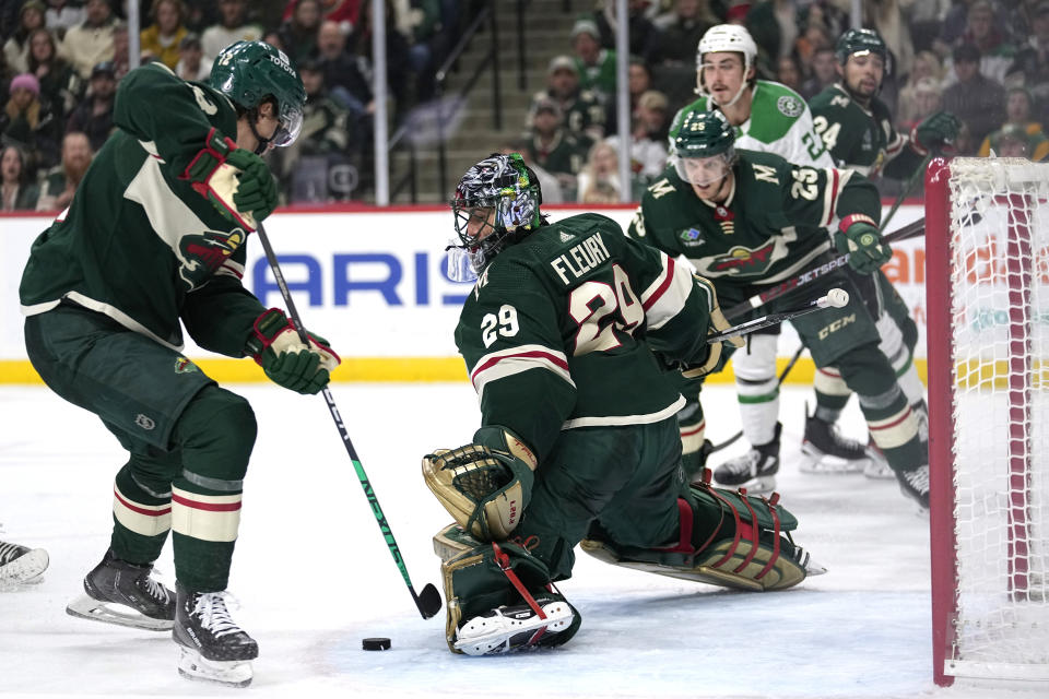 Minnesota Wild goaltender Marc-Andre Fleury (29) defends the goal during the second period of an NHL hockey game against the Dallas Stars, Thursday, Dec. 29, 2022, in St. Paul, Minn. (AP Photo/Abbie Parr)