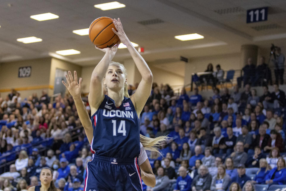 UConn's Dorka Juhasz (14) shootss against Creighton during the first half of an NCAA college basketball game Wednesday, Dec. 28, 2022, in Omaha, Neb. (AP Photo/John Peterson)