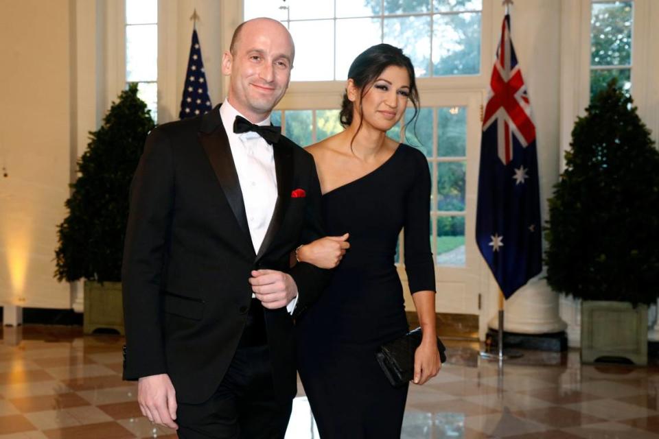 FILE - In this Sept. 20, 2019, file photo President Donald Trump’s White House Senior Adviser Stephen Miller, left, and Katie Waldman, now Miller, arrive for a State Dinner with Australian Prime Minister Scott Morrison and President Donald Trump at the White House in Washington. Vice President Mike Pence’s press secretary has the coronavirus, the White House said Friday, making her the second person who works at the White House complex known to test positive for the virus this week. Pence spokeswoman Katie Miller, who tested positive Friday, May 8, 2020, had been in recent contact with Pence but not with the president. (AP Photo/Patrick Semansky, File)
