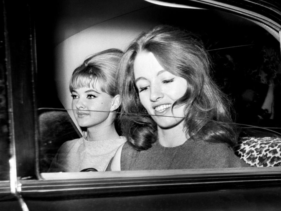 Keeler, along with her flatmate Mandy Rice-Davies (left), was subjected to huge press attention in 1963PA