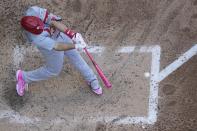 St. Louis Cardinals' Paul Goldschmidt hits an RBI single during the sixth inning of a baseball game against the Milwaukee Brewers Sunday, May 12, 2024, in Milwaukee. (AP Photo/Morry Gash)