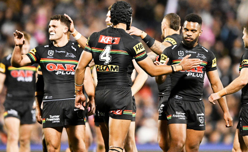 Nathan Cleary, pictured here celebrating a try with Penrith Panthers teammates.