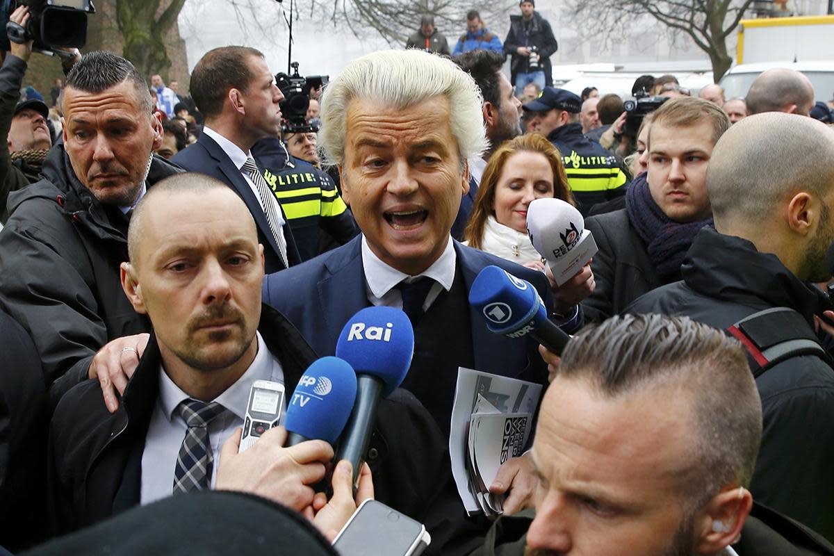 Dutch far right Party for Freedom (PVV) leader Geert Wilders is constantly flanked by security personnel   (Reuters)