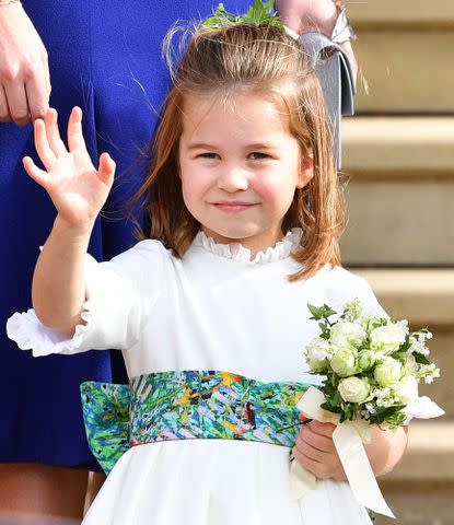 <p>Pool/Max Mumby/Getty</p> Princess Charlotte at Princess Eugenie and Jack Brooksbank's wedding in October 2018