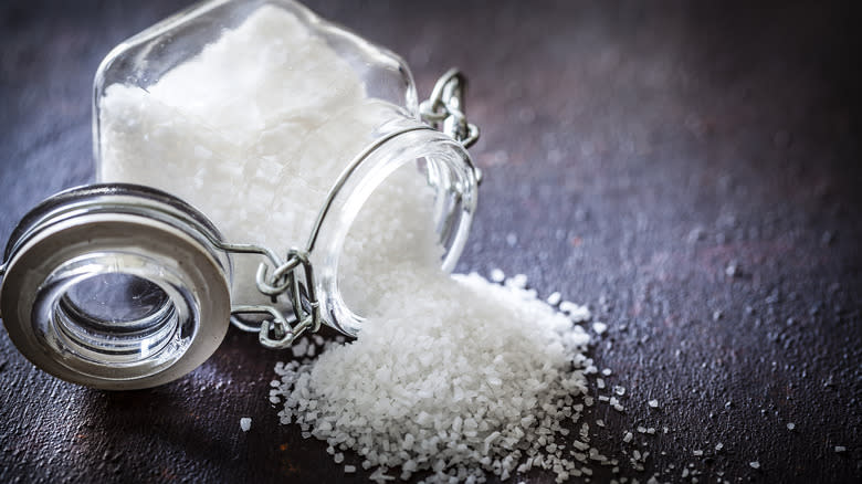 Glass container of spilled salt