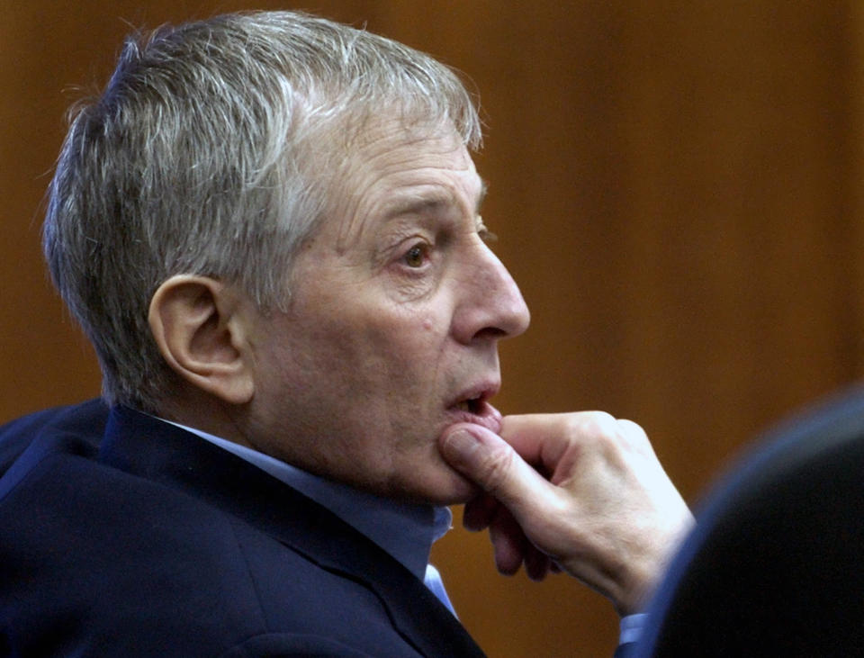 FILE - In this Friday, Sept. 19, 2003, file photo, Robert Durst sits in the courtroom as attorneys meet with the judge in chambers in Galveston, Texas. Durst, then 60, whose late father, Seymour, founded a Manhattan-based real estate empire still run by the family, is charged with the 2001 slaying of Morris Black. A Los Angeles jury convicted Robert Durst Friday, Sept. 17, 2021 of murdering his best friend Susan Berman, 20 years ago in a case that took on new life after the New York real estate heir participated in a documentary that connected him to the slaying linked to his wife's 1982 disappearance. (AP Photo/David J. Phillip, File)