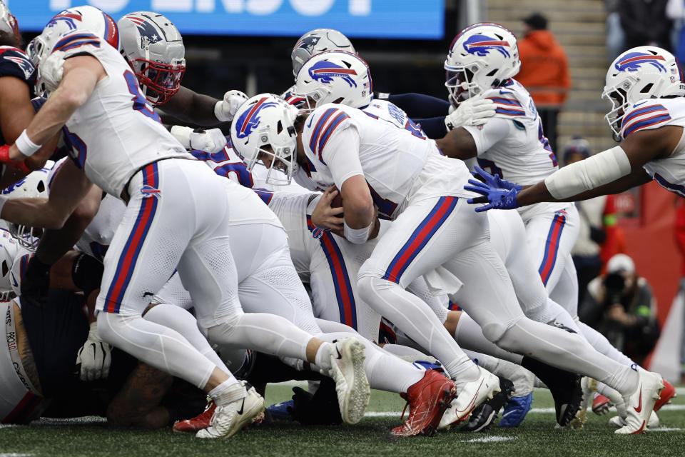 Buffalo Bills quarterback Josh Allen drives to the goal line on his touchdown during the second half of an NFL football game against the New England Patriots, Sunday, Oct. 22, 2023, in Foxborough, Mass. (AP Photo/Winslow Townson)