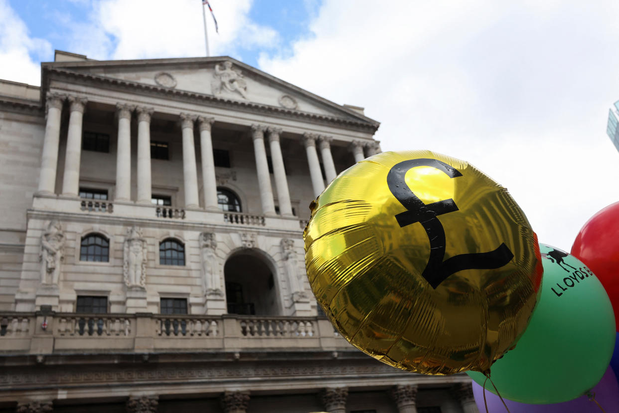 A view of a balloon with the pound symbol in front of the Bank of England during a protest against the hiking of interest rates outside the Bank of England in London, Britain, August 3, 2023. REUTERS/Susannah Ireland