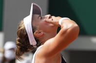 Czech Republic's Barbora Krejcikova celebrates after defeating Russia's Anastasia Pavlyuchenkova during their final match of the French Open tennis tournament at the Roland Garros stadium Saturday, June 12, 2021 in Paris. (AP Photo/Michel Euler)