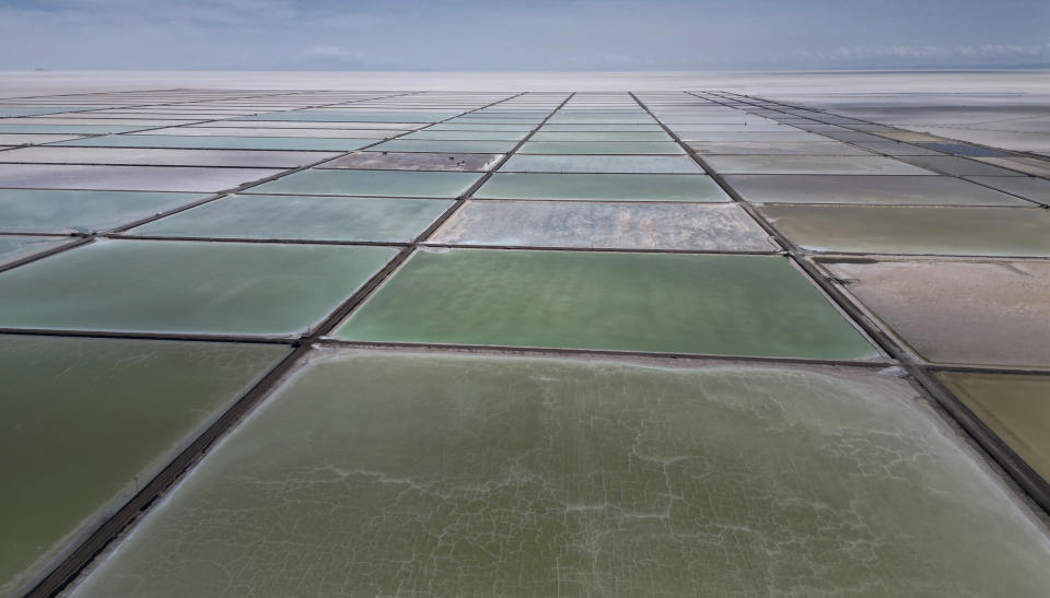 FILE - Salt recovery pools in different degrees of evaporation are visible at an industrial plant that produces lithium carbonate to manufacture lithium batteries, on the outskirts of Llipi, Bolivia, Dec. 15, 2023. The United Nations Environment Assembly is meeting in Nairobi on Monday, Feb. 26, to discuss how countries can work together to tackle environmental crises like climate change, pollution and loss of biodiversity. (AP Photo/Juan Karita, File)