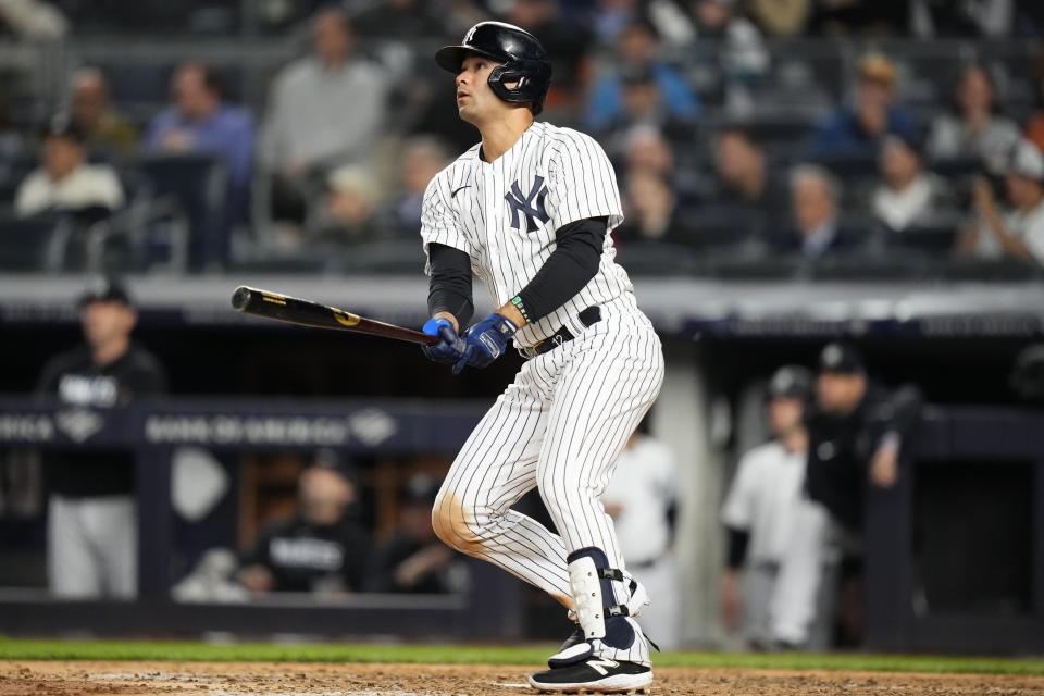 New York Yankees' Isiah Kiner-Falefa watches his two-run home run against the Baltimore Orioles during the fifth inning of a baseball game Wednesday, May 24, 2023, in New York. (AP Photo/Frank Franklin II)