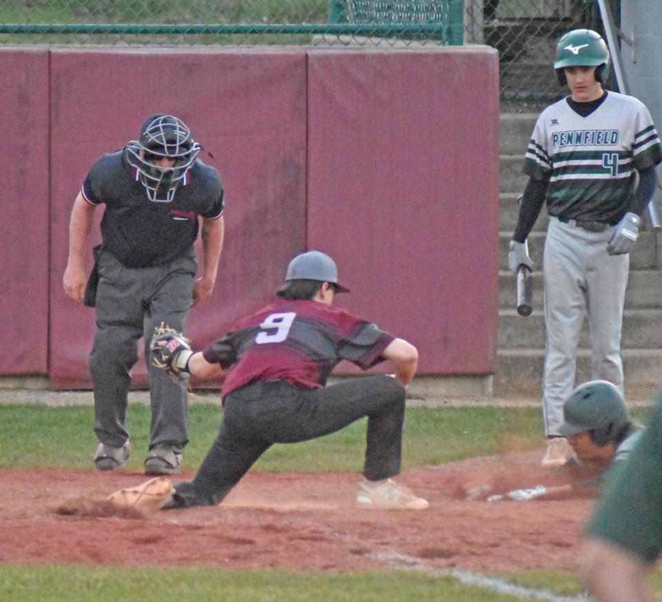 Union City's Carson Liles makes a play at the plate late in the Chargers loss to Pennfield