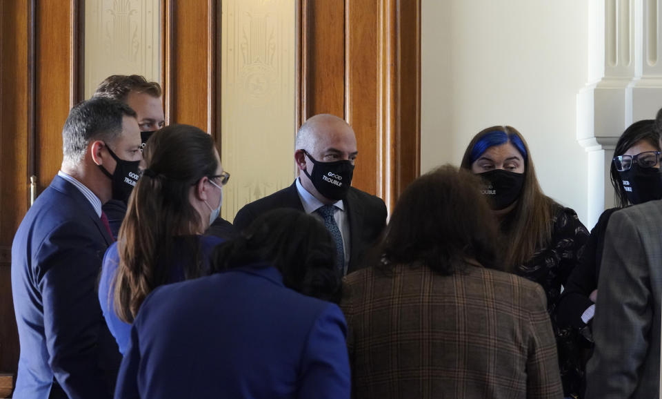 Democratic lawmakers gather in the House Chamber at the Texas Capitol as they wait to hear debate on voter legislation in Austin, Texas, Thursday, May 6, 2021. (AP Photo/Eric Gay)