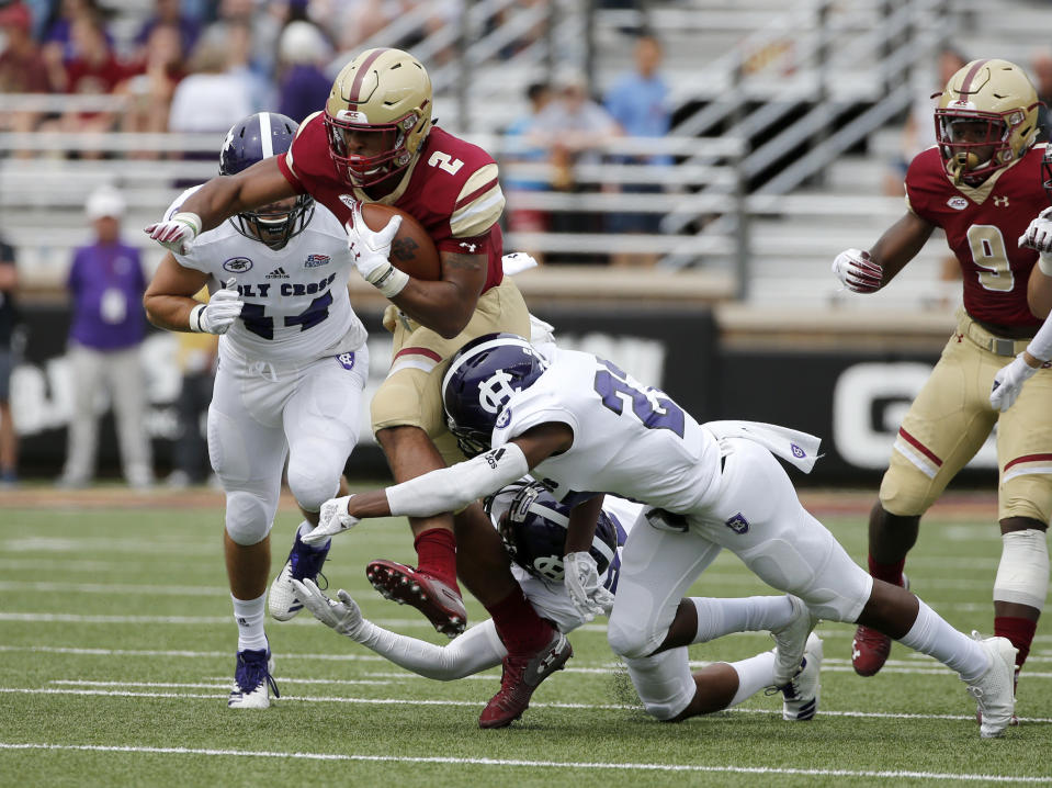 Boston College running back AJ Dillon (2) is a dark horse in the Heisman Trophy race this season. (AP)