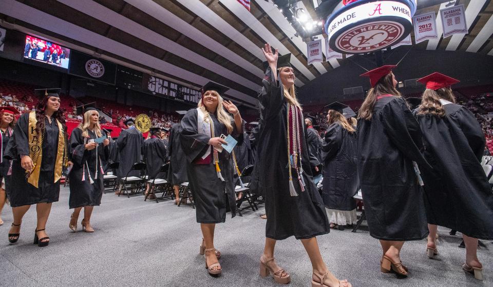 Graduates process in for their University of Alabama Commencement at Coleman Coliseum on the UA campus in Tuscaloosa, Ala., on Fiday May 3, 2024.