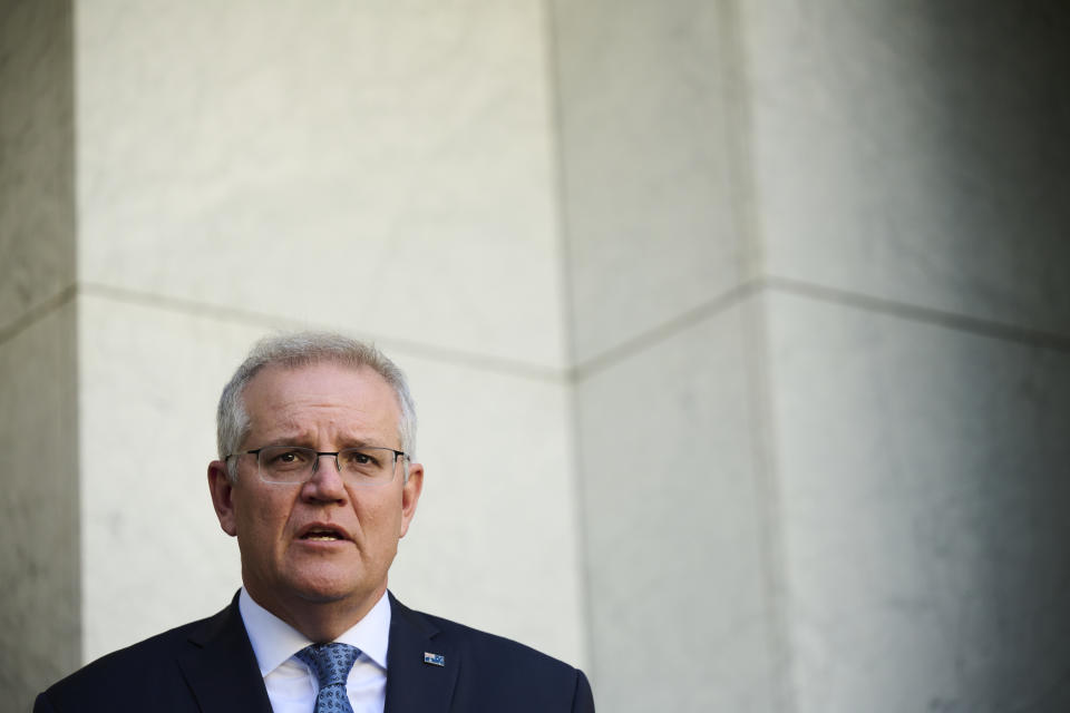 CANBERRA, AUSTRALIA - AUGUST 23: Australian Prime Minister Scott Morrison discusses the Government's plan to 'live with the virus' during a press conference at Parliament House on August 23, 2021 in Canberra, Australia. Federal parliament has resumed in Canberra, despite the ACT being in lockdown due to growing COVID-19 cases. NSW and Victoria are also currently in lockdown as health authorities work to contain the spread of the highly contagious Delta strain of the coronavirus. (Photo by Rohan Thomson/Getty Images)